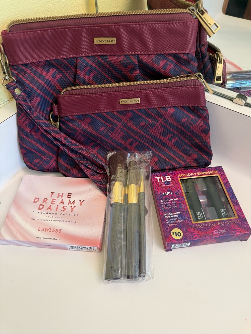 Travelon Burgundy and Navy Patterned pouch w, palette, brushes, and lip balm